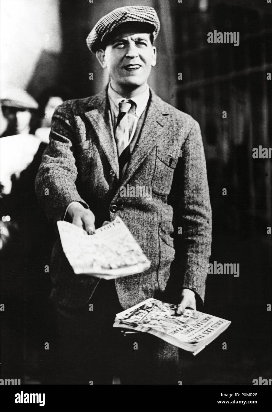 Original Film Title: SOUS LES TOITS DE PARIS.  English Title: UNDER THE ROOFS OF PARIS.  Film Director: RENE CLAIR.  Year: 1930.  Stars: ALBERT PREJEAN. Stock Photo