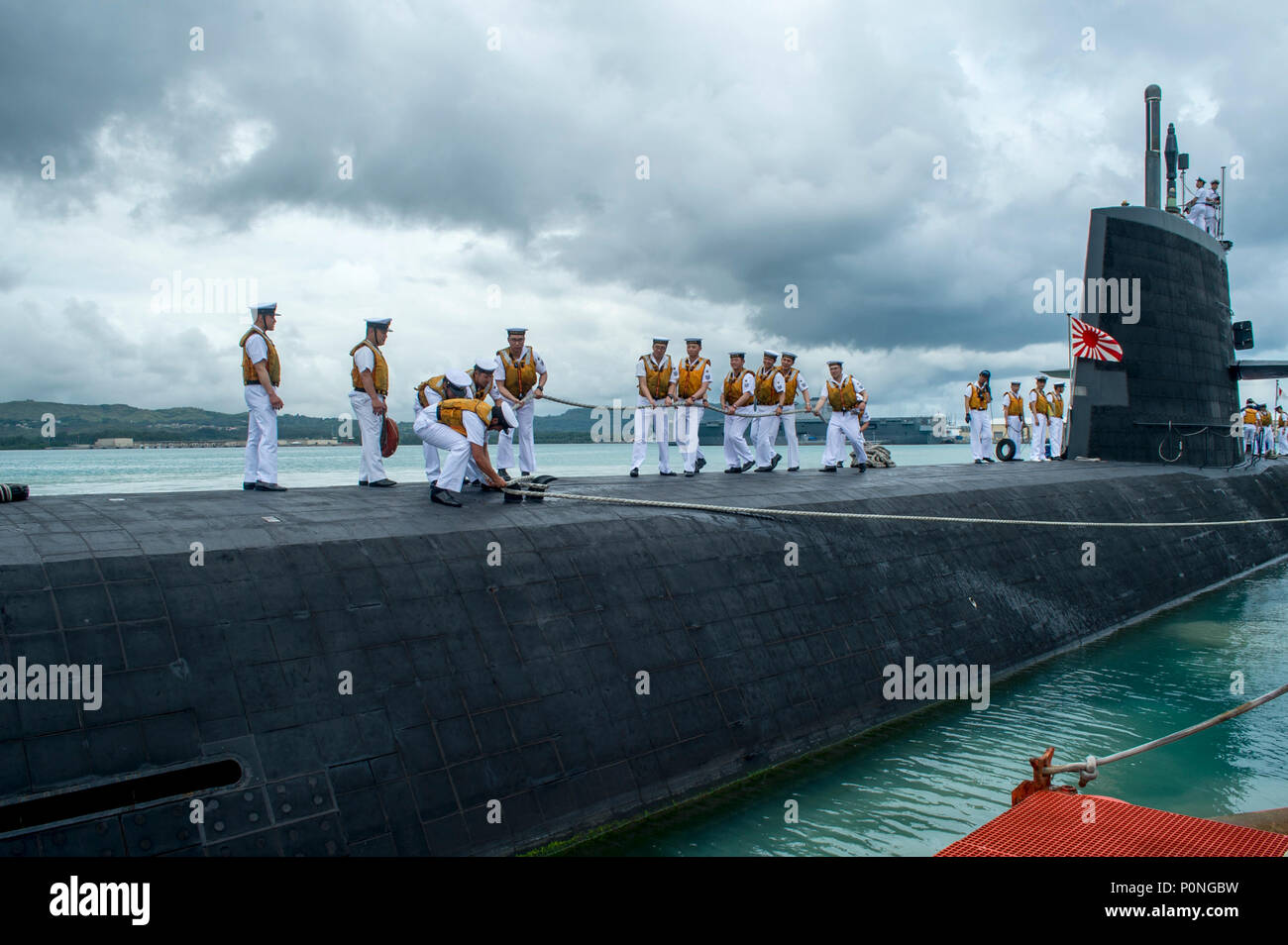 180607-N-WI626-012  APRA HARBOR, Guam (June 7, 2018) The Japan Maritime Self-Defense Force submarine JS Soryu (SS-501) arrives in Guam for a port visit. (U.S. Navy photo by Lieutenant Lauren Spaziano/Released) Stock Photo