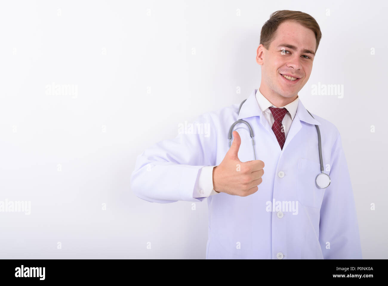 Smiling white male doctor hi-res stock photography and images - Alamy