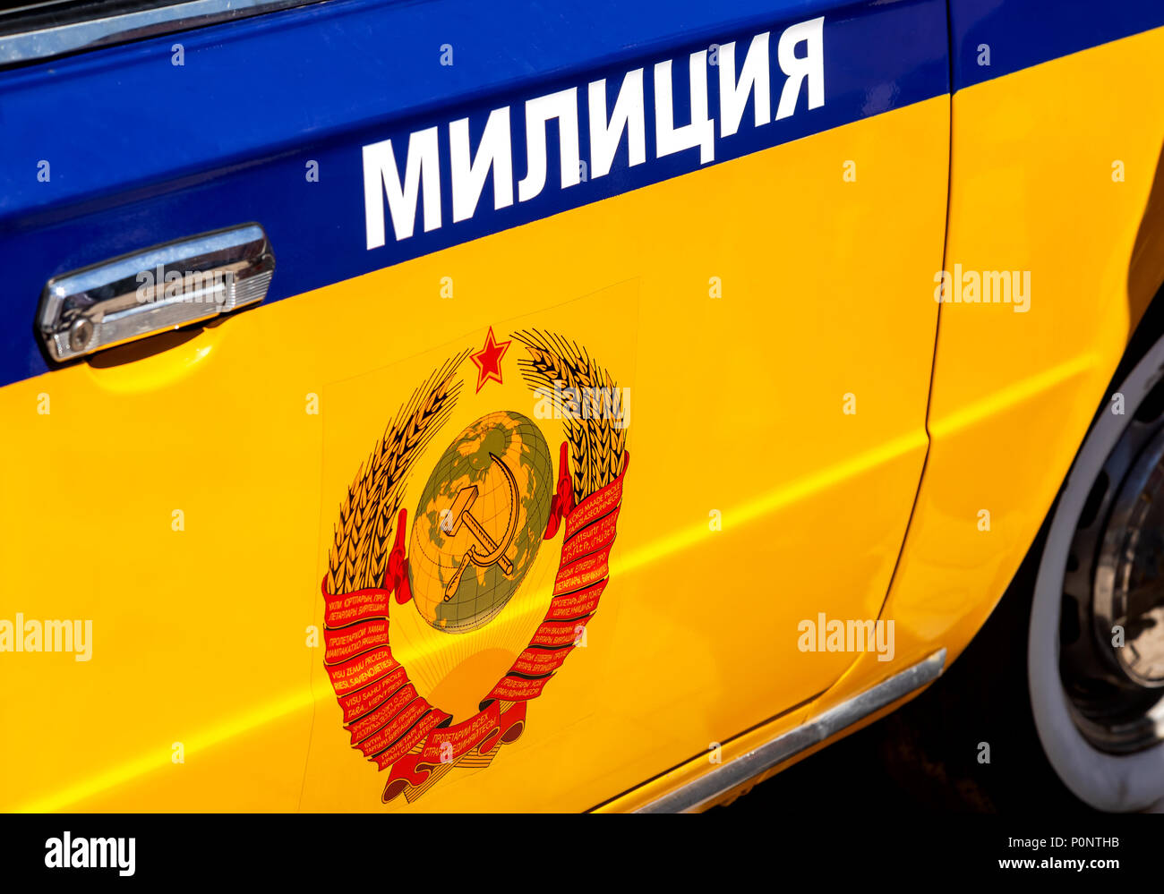 Samara, Russia - May 27, 2018: Inscription 'Militsia' (police) and emblem of the former soviet union on the board of russian police car Stock Photo