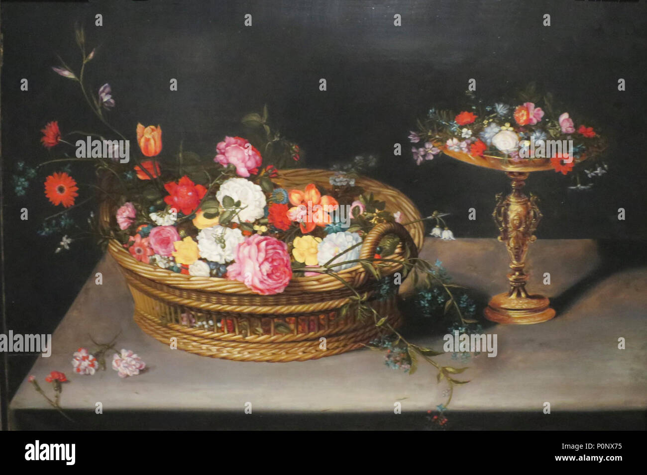 An Elaborate Basket of Flowers and a Tazza with Grapes