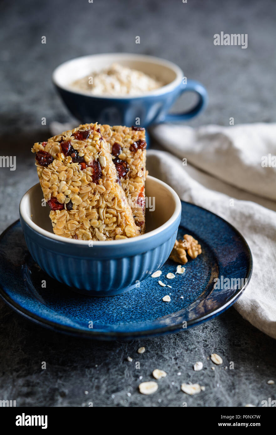 Healthy granola bars with cranberries, walnuts, sunflower seeds and
