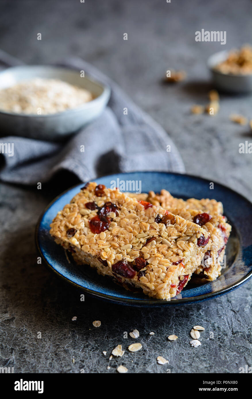 Healthy granola bars with cranberries, walnuts, sunflower seeds and