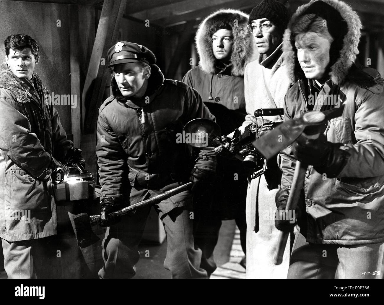 Original Film Title: THE THING FROM ANOTHER WORLD. English Title: THE THING  FROM ANOTHER WORLD. Film Director: HOWARD HAWKS. Year: 1951. Stars: KENNETH  TOBEY; DEWEY MARTIN; DOUGLAS SPENCER. Credit: RKO / Album