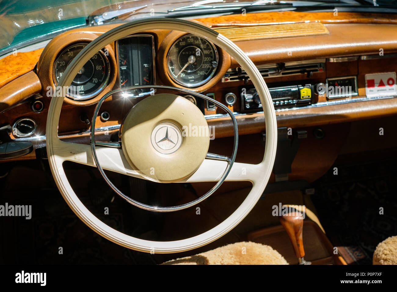 Berlin, Germany - june 09, 2018: Steering wheel, dashboard and interior of beautiful vintage car cockpit at Classic Days, a Oldtimer  event for vintag Stock Photo
