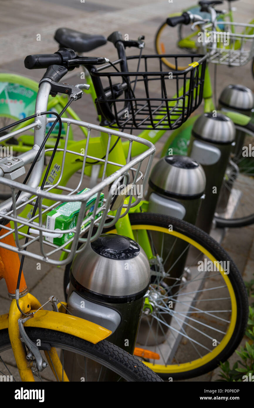 Suzhou, Jiangsu, China.  Rental Bikes Waiting to be Hired. Stock Photo
