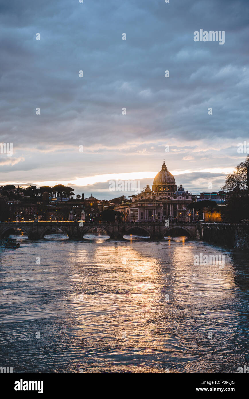 st peters basilica and tiber river during sunrise in Rome, Italy Stock ...