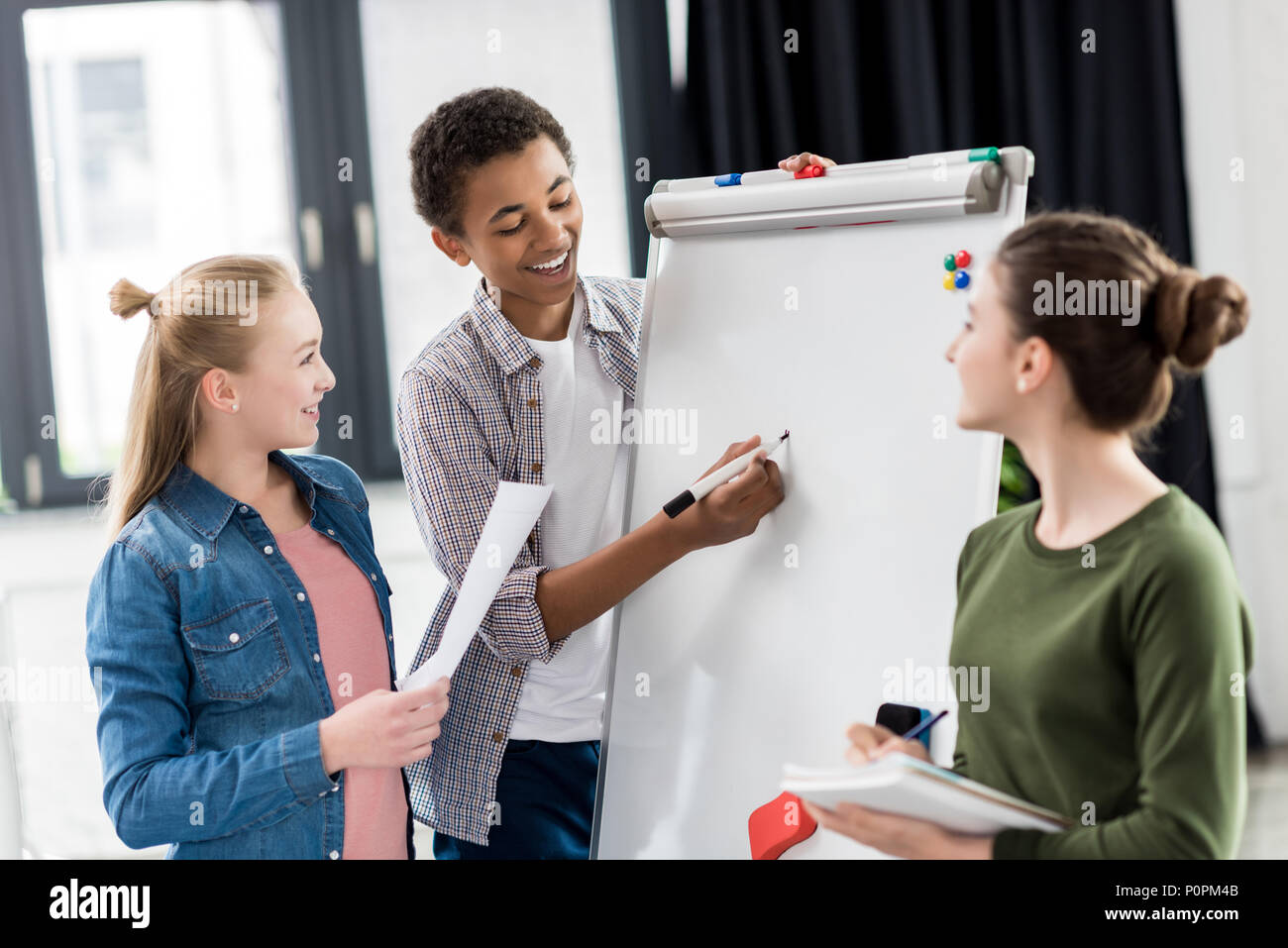 African american teen boy writing hi-res stock photography and images ...