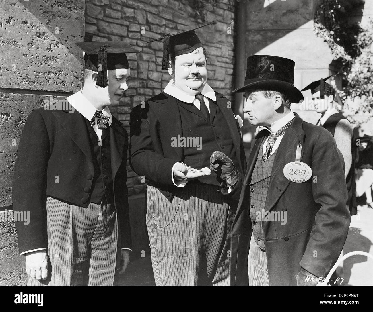Original Film Title: A CHUMP AT OXFORD.  English Title: A CHUMP AT OXFORD.  Film Director: ALF GOULDING.  Year: 1940.  Stars: OLIVER HARDY; STAN LAUREL. Credit: HAL ROACH/UNITED ARTISTS / Album Stock Photo