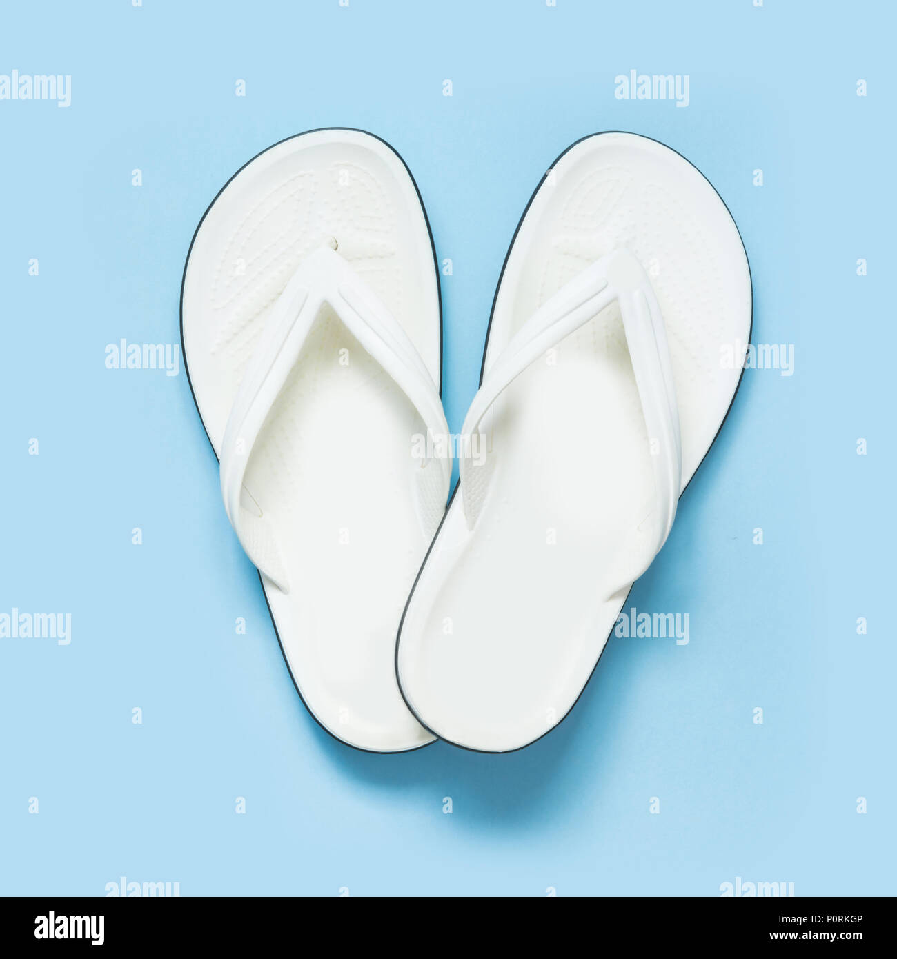 White flip flops hi-res stock photography and images - Alamy