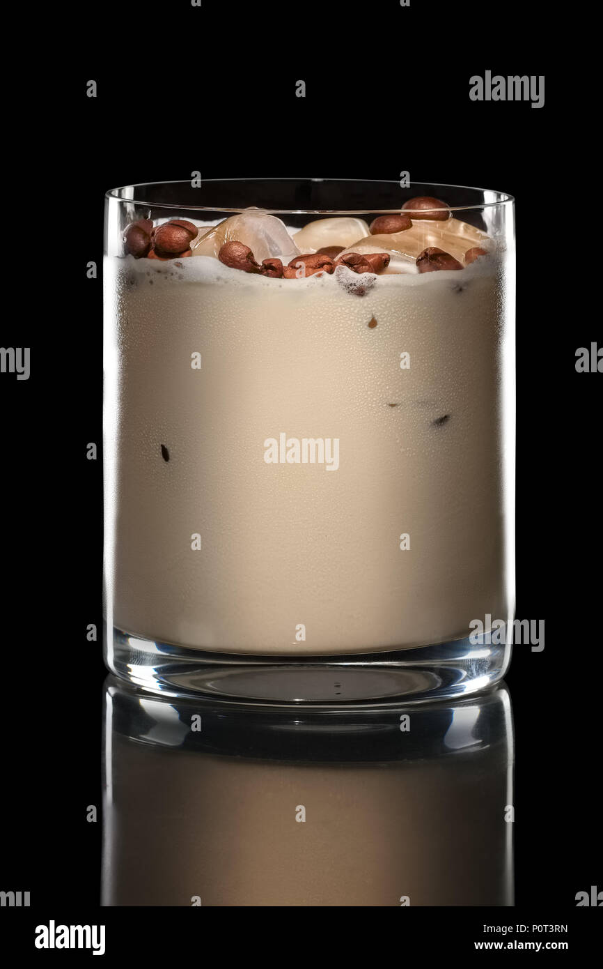 Irish cream cocktail in Rocks glass isolated on black Stock Photo