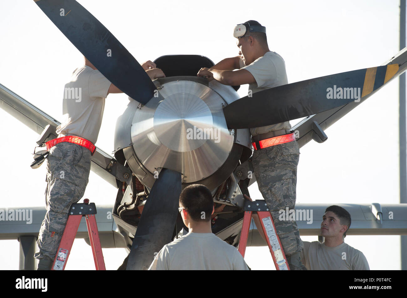 49th Aircraft Maintenance squadron Airmen attach an engine cover panel