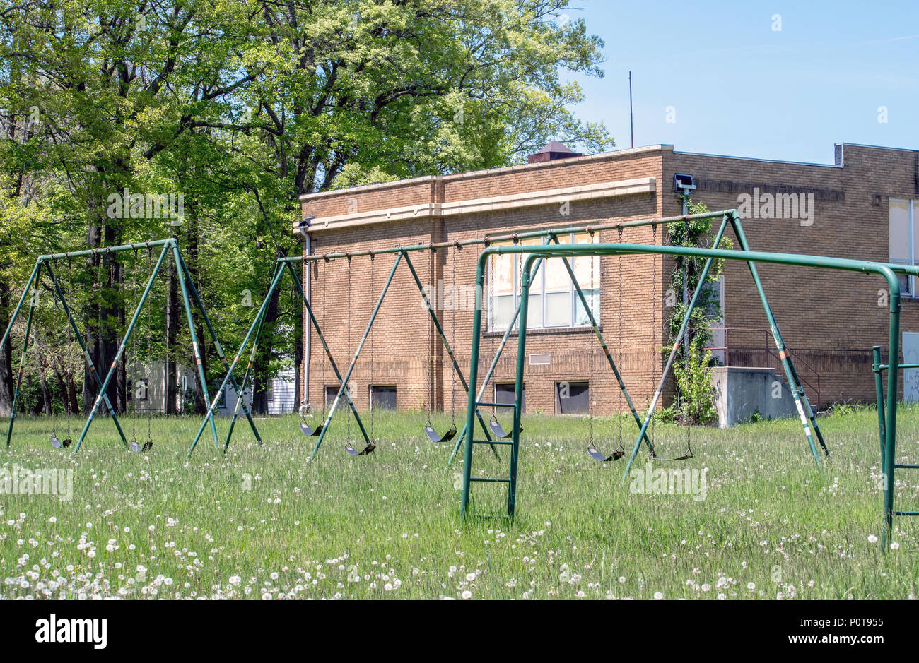 Abandoned school and play yard Stock Photo