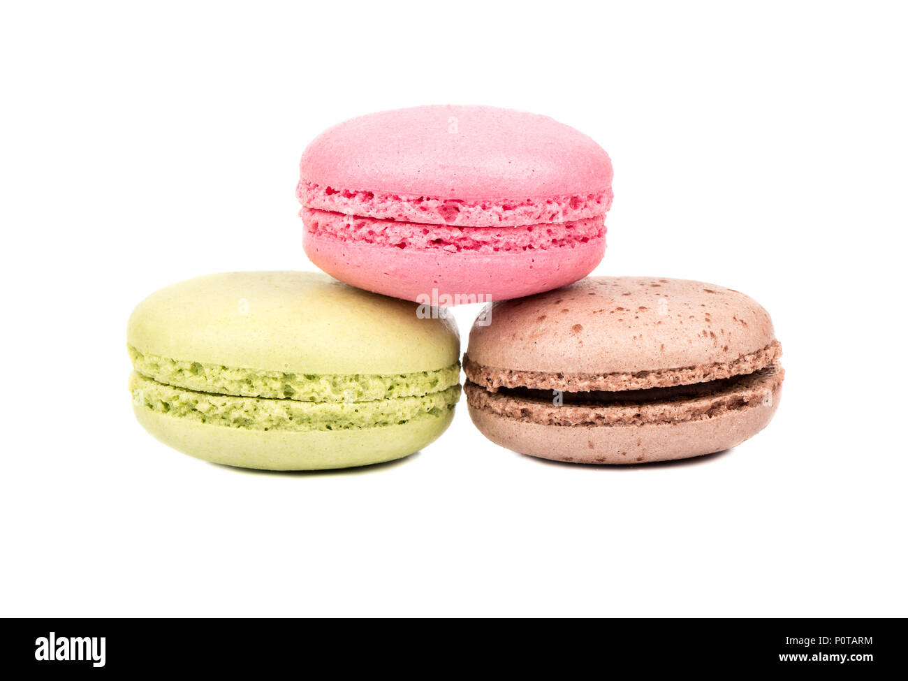 Delicious three multicolored macaroon on a white background Stock Photo