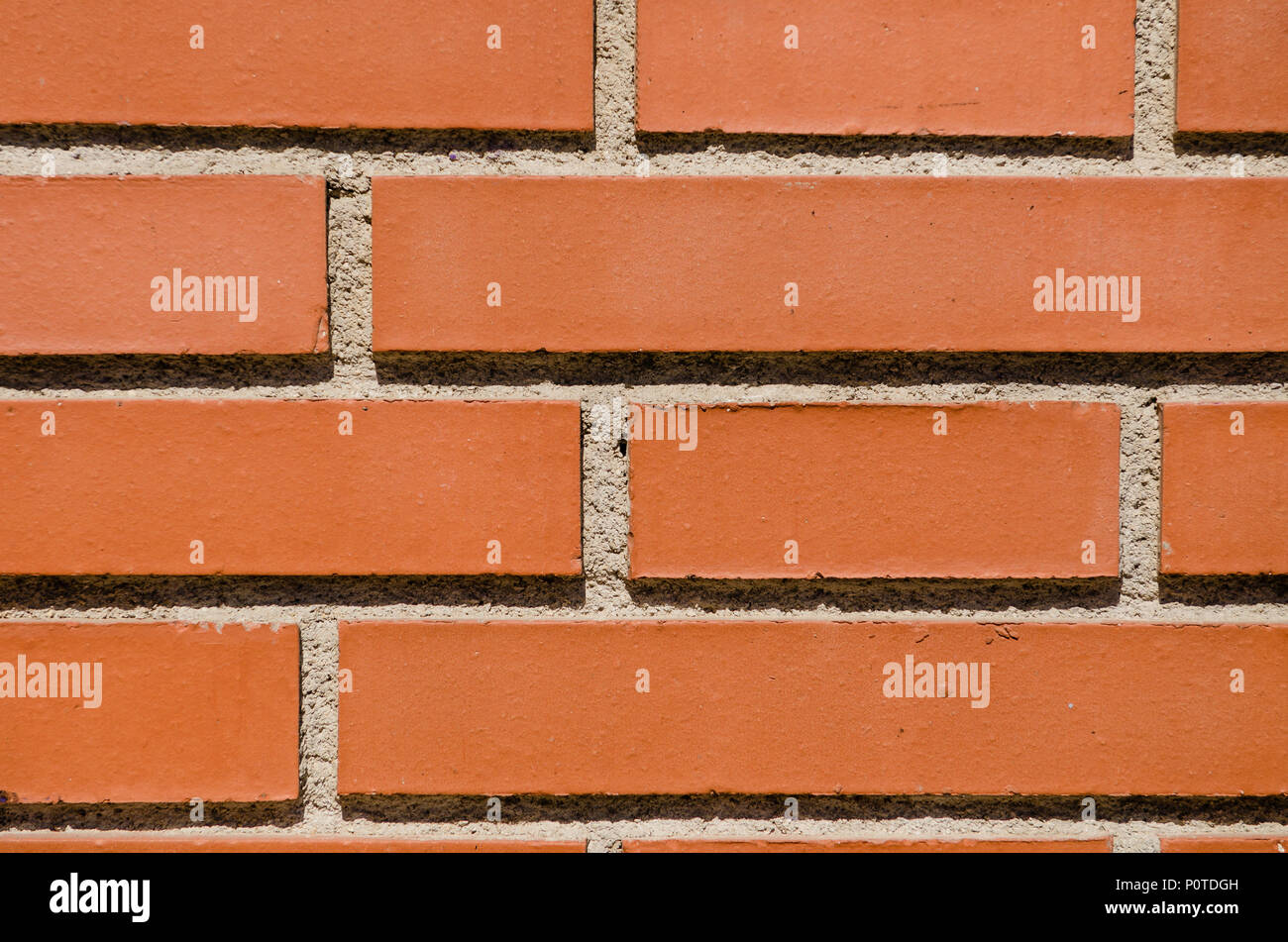 Red new brick wall pattern background. Front or top view. Stock Photo