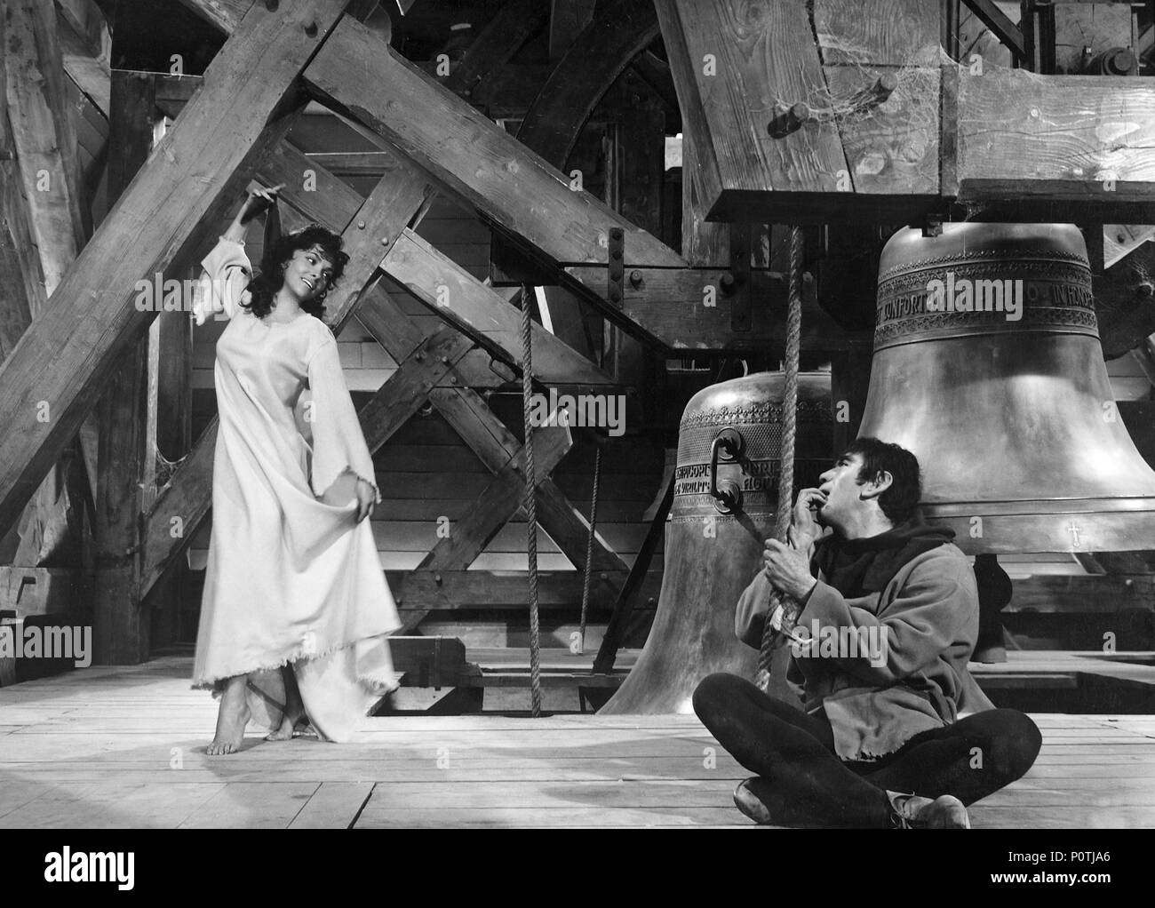 Original Film Title: NOTRE DAME DE PARIS.  English Title: THE HUNCHBACK OF NOTRE DAME.  Film Director: JEAN DELANNOY.  Year: 1956.  Stars: ANTHONY QUINN; GINA LOLLOBRIGIDA. Credit: PARIS-FILM PRODUCTIONS/ALLIED ARTISTS / VOINQUEL, RAYMOND / Album Stock Photo