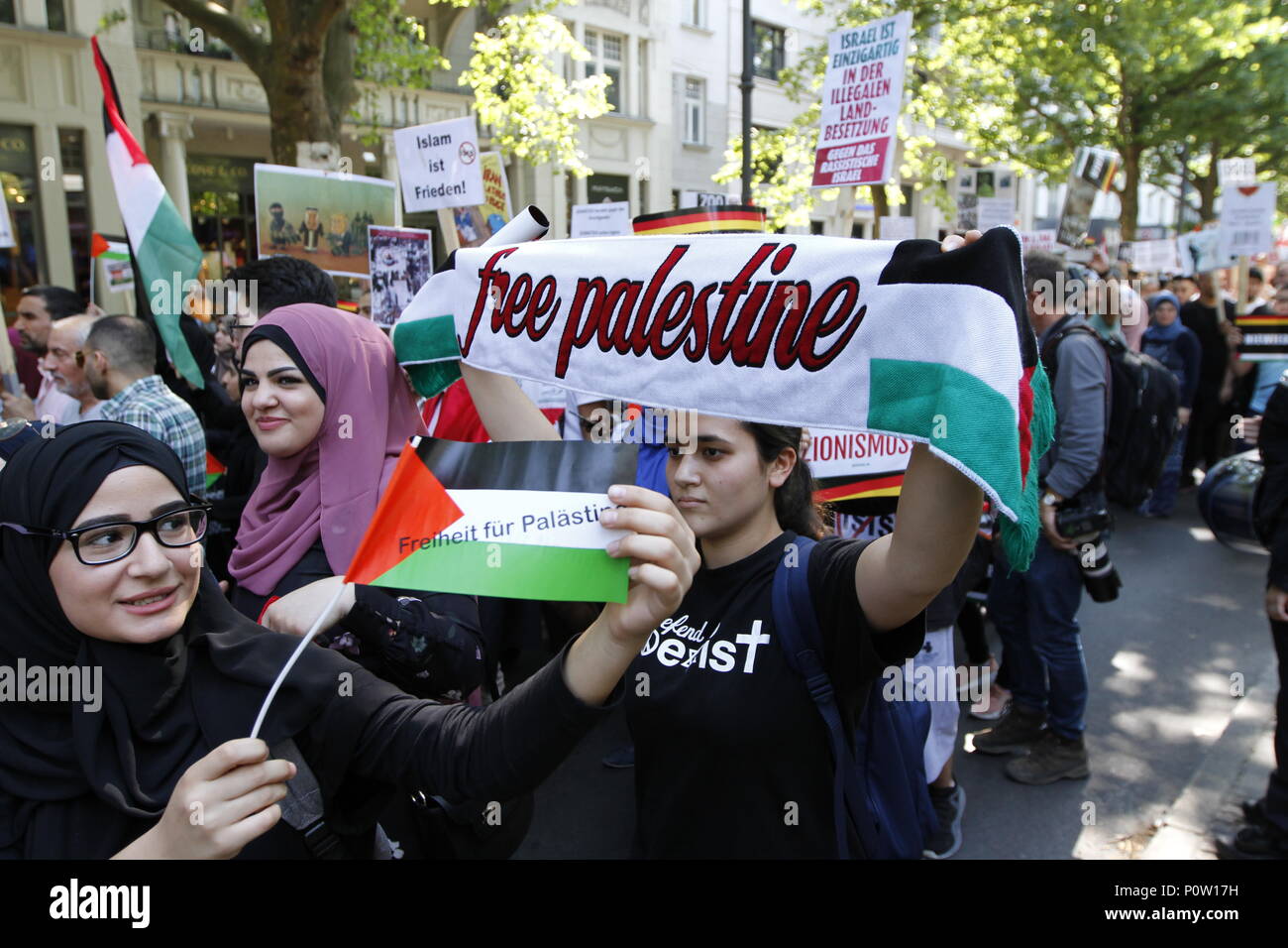 Berlin, Germany. 09th June, 2018. Approximately 2000 participants of the anti-Israel al-Quds demonstration are passing through Berlin. The police accompany the event with the utmost vigilance. Every year it comes to anti-Semitic incitement and crime. The protest now attracts extremists of the political spectrum, from sympathizers of Hamas and Hizballah to neo-Nazis. Motto of the event 'Crusade against Islam? Together against the injustice on the street!'. Credit: Simone Kuhlmey/Pacific Press/Alamy Live News Stock Photo