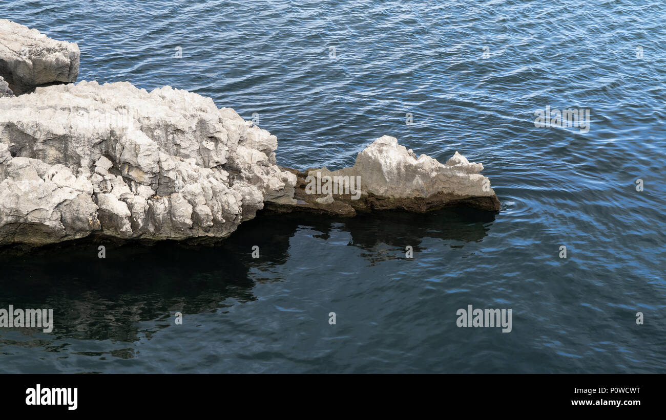 Calari Rocks Clear and crystalline sea with white rocks Stock Photo - Alamy
