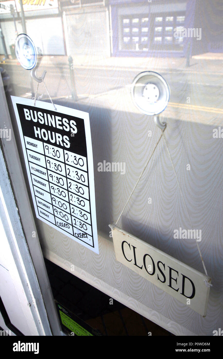 Opening hours in a small cafe in Dinnington South Yorkshire an old
