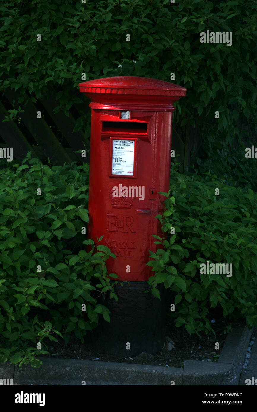 Red Post box sighted at a Tesco site Stock Photo Alamy