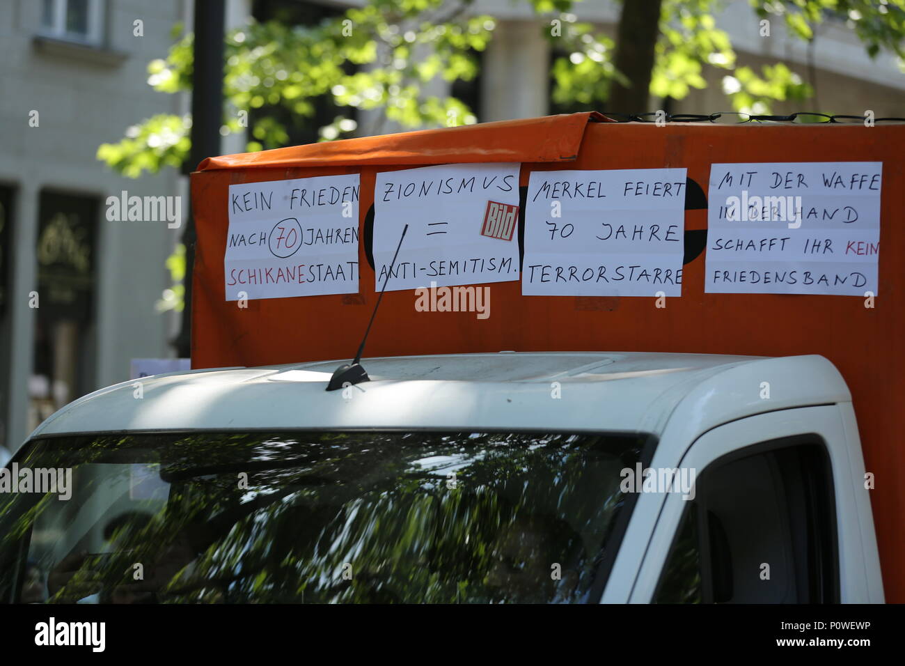 Berlin, Germany. 09th June, 2018. Approximately 2000 participants of the anti-Israel al-Quds demonstration are passing through Berlin. The police accompany the event with the utmost vigilance. Every year it comes to anti-Semitic incitement and crime. The protest now attracts extremists of the political spectrum, from sympathizers of Hamas and Hizballah to neo-Nazis. Motto of the event 'Crusade against Islam? Together against the injustice on the street!'. Credit: Simone Kuhlmey/Pacific Press/Alamy Live News Stock Photo