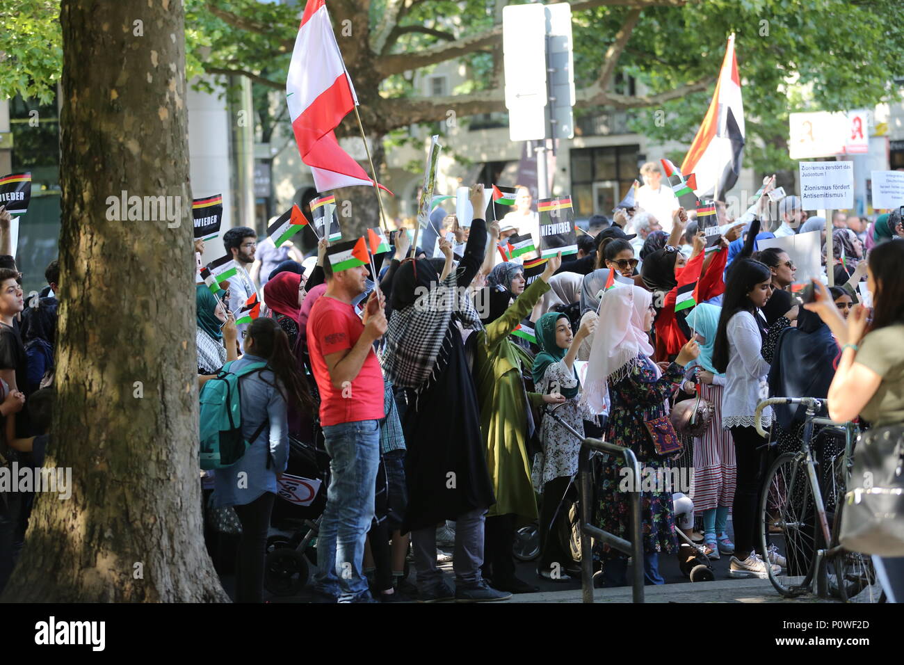 Berlin, Germany. 09th June, 2018. Approximately 2000 participants of the anti-Israel al-Quds demonstration are passing through Berlin. The police accompany the event with the utmost vigilance. Every year it comes to anti-Semitic incitement and crime. The protest now attracts extremists of the political spectrum, from sympathizers of Hamas and Hizballah to neo-Nazis. Motto of the event 'Crusade against Islam? Together against the injustice on the street!'. Credit: Simone Kuhlmey/Pacific Press/Alamy Live News Stock Photo