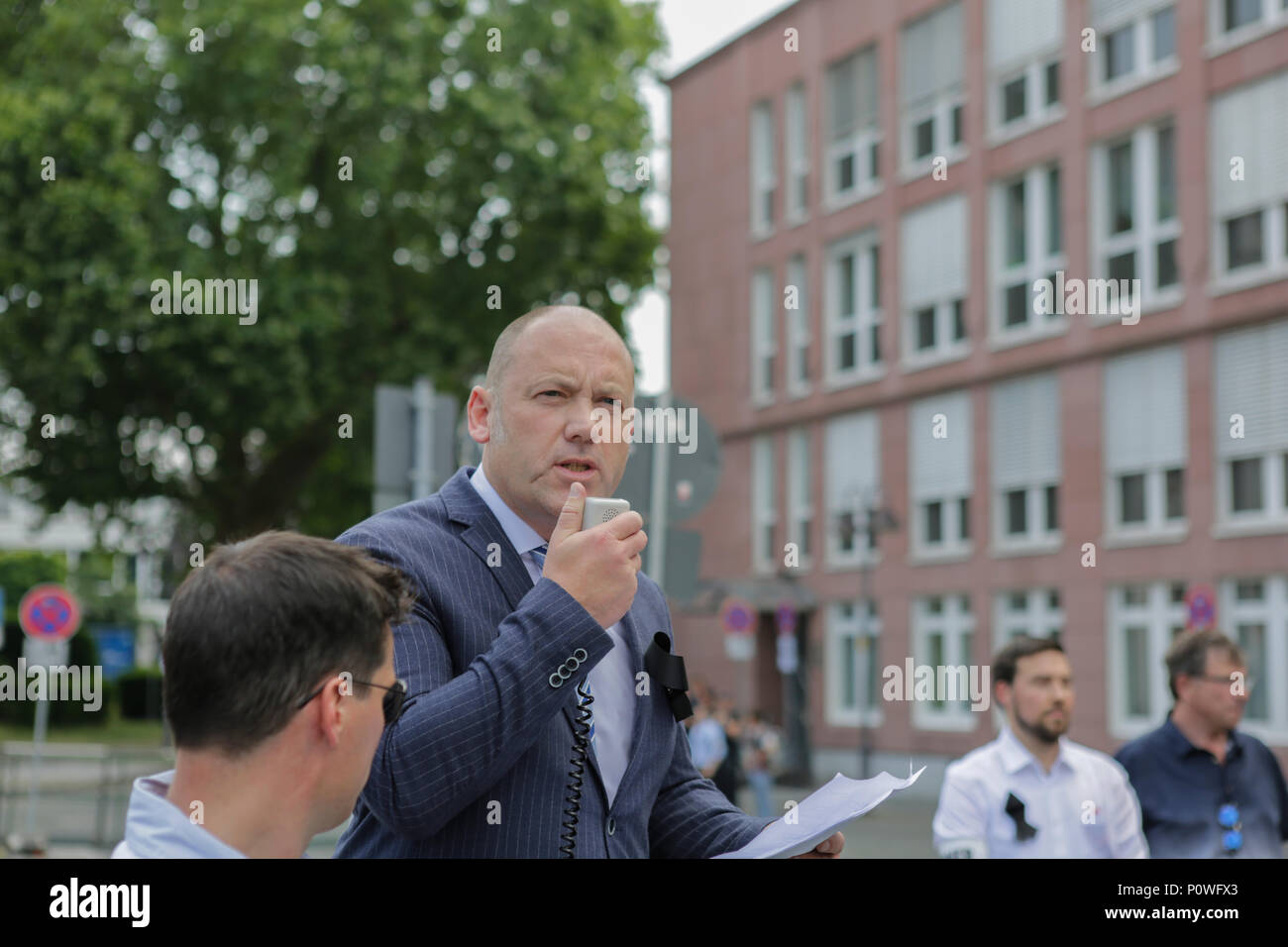 Mainz, Germany. 9th June 2018. The vice parliamentary leader of the AfD party in the Landtag (parliament) of Rhineland-Palatinate Joachim Paul speaks at the vigil.  who was killed by an Asylum seeker. They accused German Chancellor Angela Merkel and the Rhineland-Palatinate Minister?President Malu Dreyer to be responsible for the killing, as they invited the ref Credit: PACIFIC PRESS/Alamy Live News Stock Photo