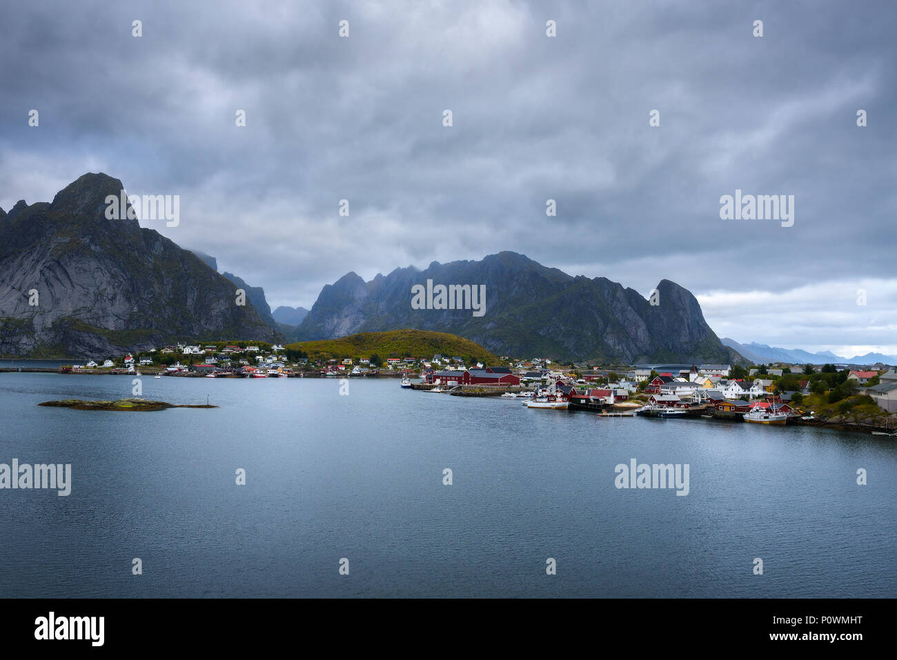 Mount Olstind and Reine fishing village on Lofoten islands Stock Photo