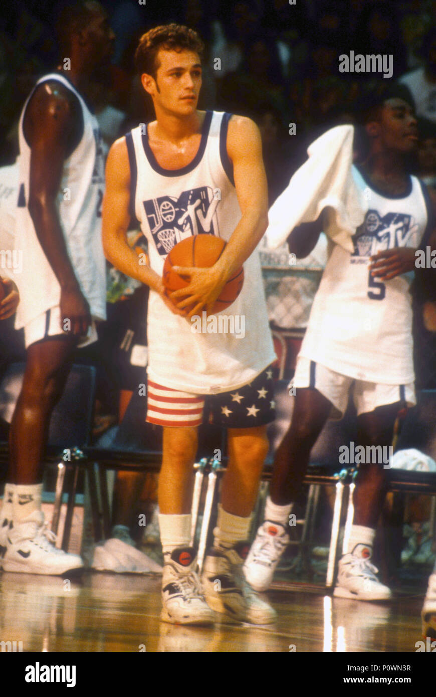LOS ANGELES, CA - SEPTEMBER 15: Actor Luke Perry attends MTV's First Annual Rock 'N Jock Basketball Game on September 15, 1991 at Loyola Marymount University in Los Angeles, California. Photo by Barry King/Alamy Stock Photo Stock Photo