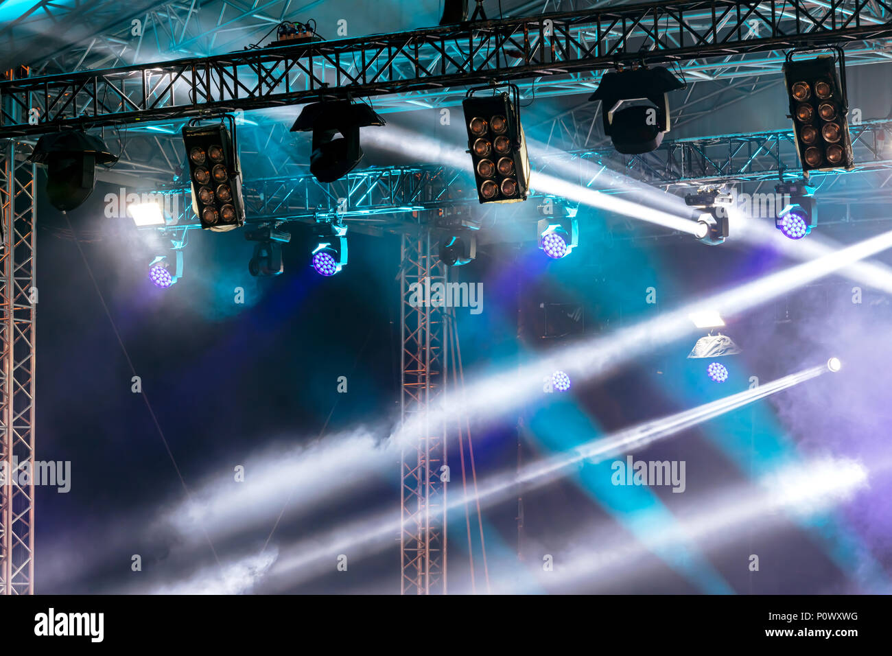 stage lighting effects. of bright lights over stage. professional equipment Stock Photo -
