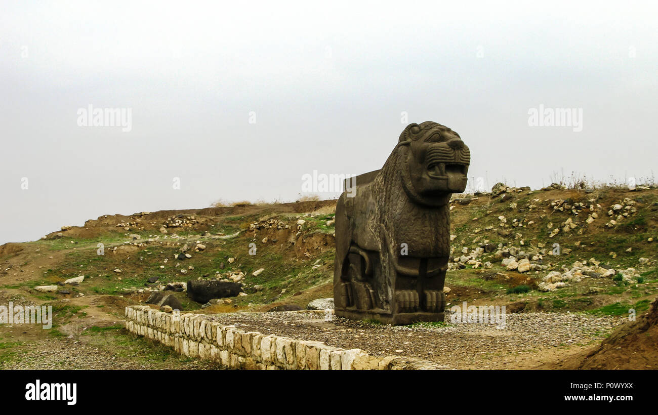 Basalt lion statue, Ruins of Ain Dara temple near Aleppo, Syria Stock Photo
