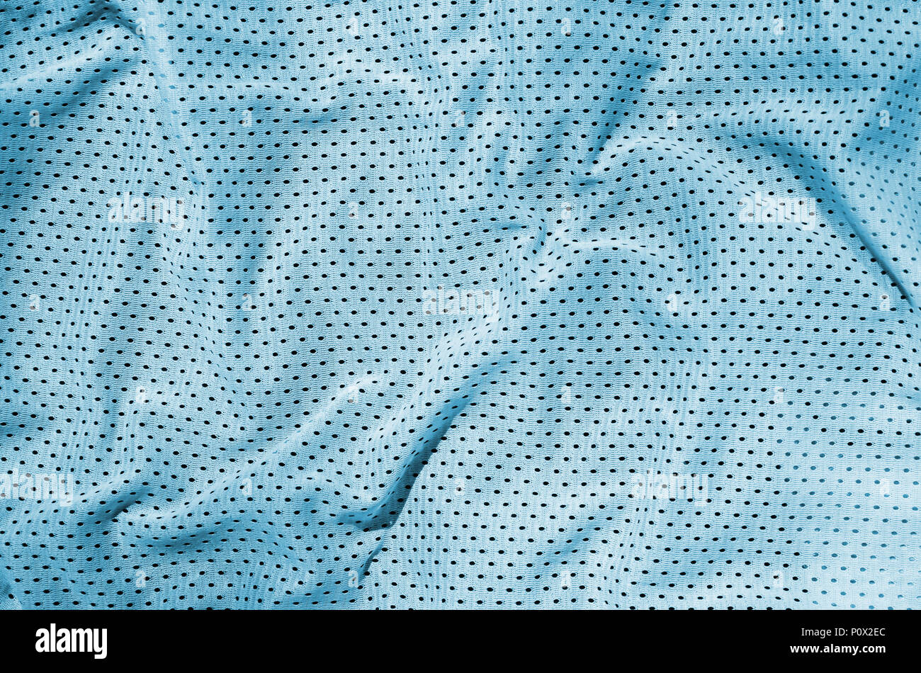 Sport clothing fabric texture background. Top view of light blue polyester  nylon cloth textile surface. Colored basketball shirt with free space for t  Stock Photo - Alamy