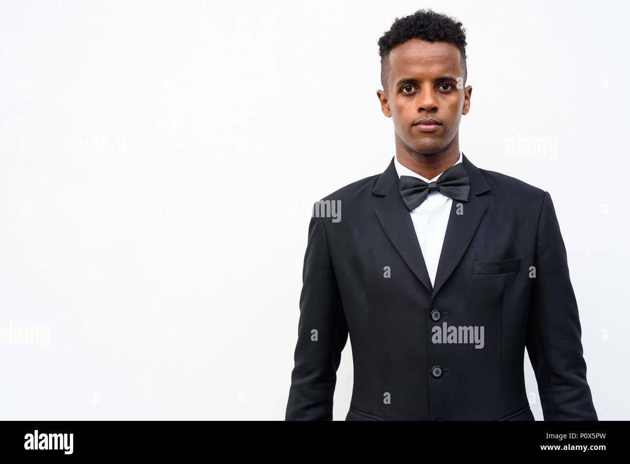 Man wearing white suit hi-res stock photography and images - Alamy