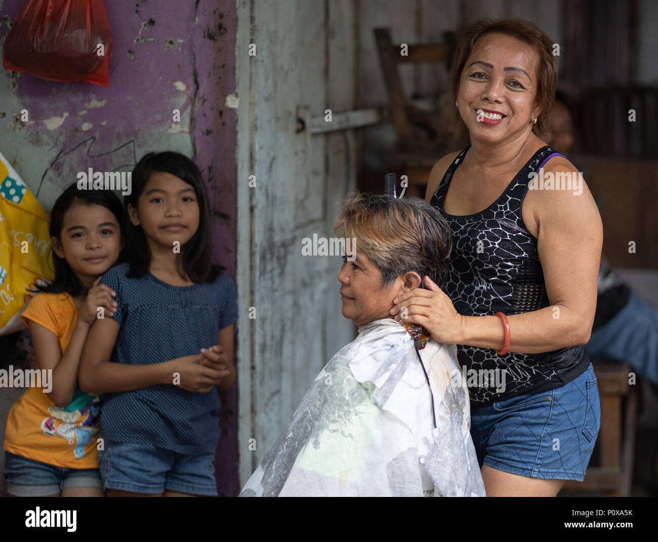 Gay Hairdresser Cutting A Womans Hair Carbon Market Cebu City