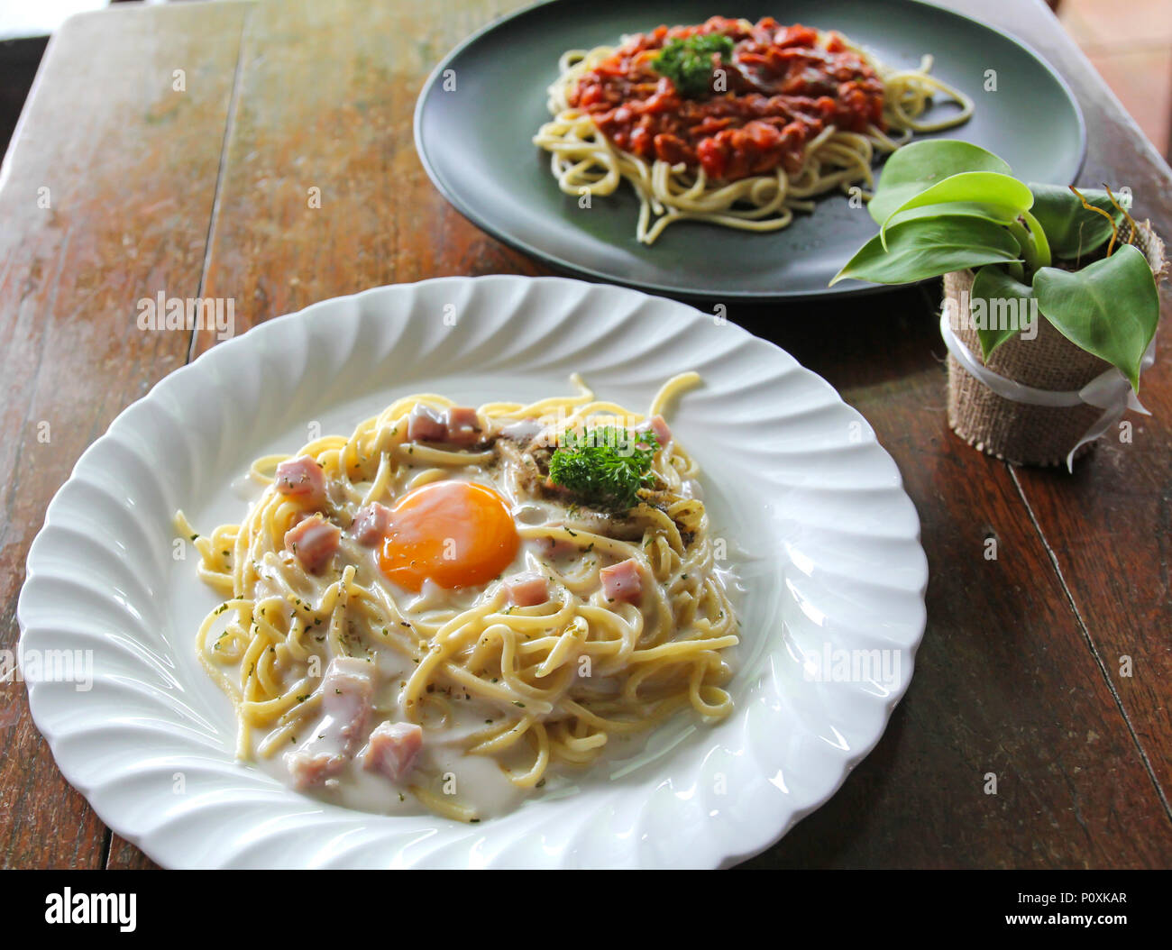 Spaghetti Carbonara with egg yolk and Spaghetti italian pasta with