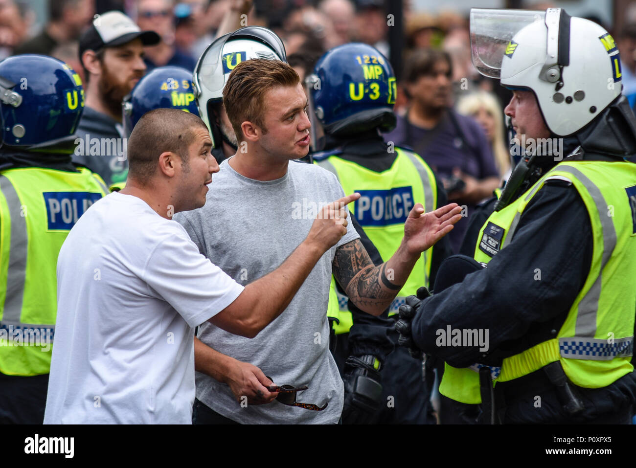Supporters of Tommy Robinson such as the EDL protested in London demonstrating for his release. At times this turned to violence against police Stock Photo