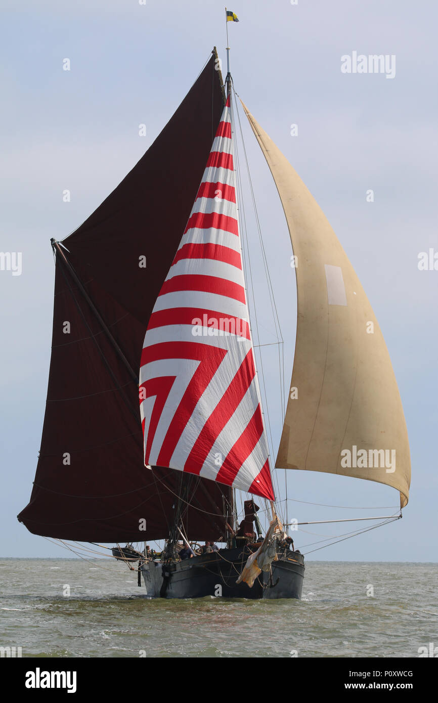 River Medway, Kent, United Kingdom. 9th June, 2018. SB Marjorie racing towards to the finish line in the Medway barge match. Seven historic sailing barges have taken part in the 110th Medway Sailing Barge Match. Until they were replaced by modern shipping and cargo methods, sailing barges plied their trade on the UK's waterways. Rob Powell/Alamy Live News Stock Photo