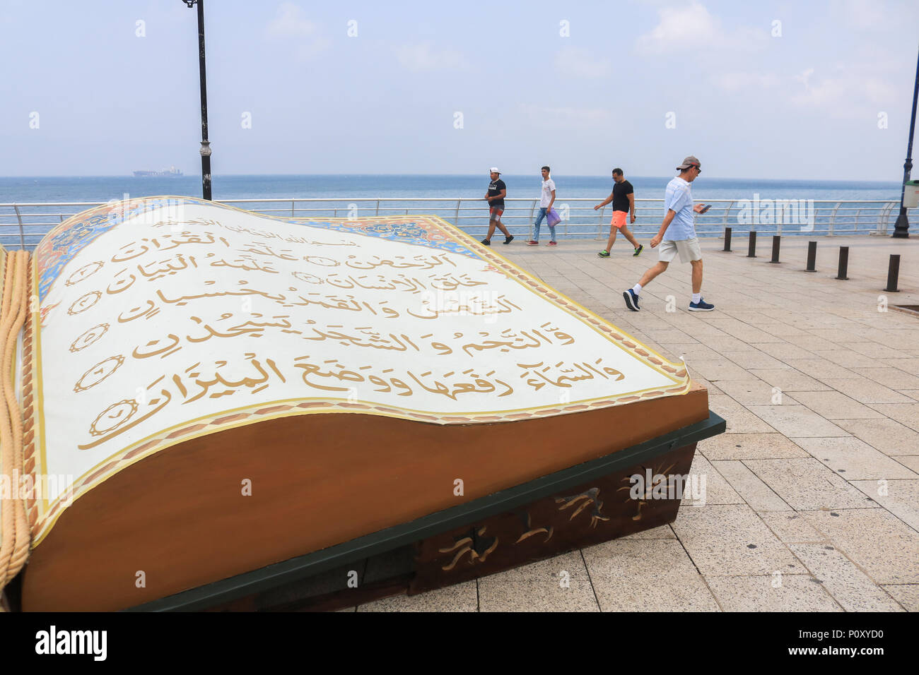 Beirut Lebanon. 10th June. A large opened Quran book is displayed on the Beirut  seafront promenade  to celebrate the Islamic holy month of Ramadan which ends on 15th June. Ramdan traditionally falls on the ninth month of the Islamic calendar, and is observed by Muslims worldwide as a month of fasting (Sawm) to commemorate the first revelation of the Quran to the prophet Muhammad Credit: amer ghazzal/Alamy Live News Stock Photo