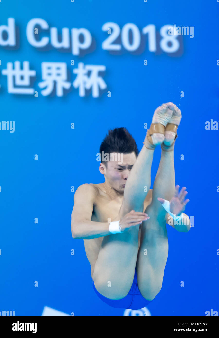 Wuhan. 10th June, 2018. Chen Aisen of China competes during the men's 10m platform final at the FINA Diving World Cup 2018 in Wuhan, central China's Hubei Province on June 10, 2018. Chen claimed the title with a total of 557.80 points. Credit: Xiong Qi/Xinhua/Alamy Live News Stock Photo