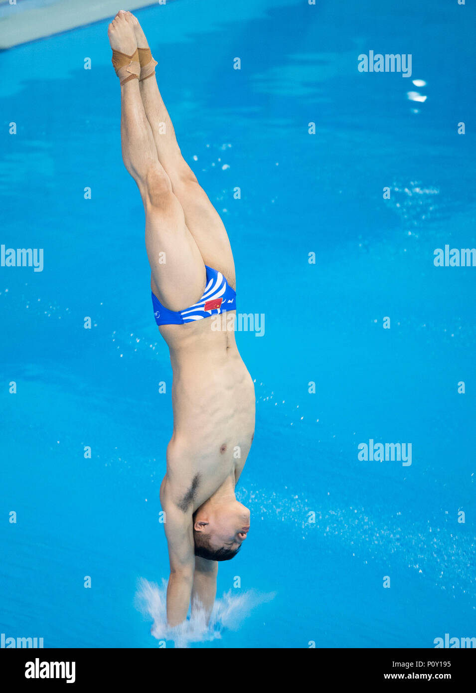 Wuhan. 10th June, 2018. Chen Aisen of China competes during the men's 10m platform final at the FINA Diving World Cup 2018 in Wuhan, central China's Hubei Province on June 10, 2018. Chen claimed the title with a total of 557.80 points. Credit: Xiao Yijiu/Xinhua/Alamy Live News Stock Photo