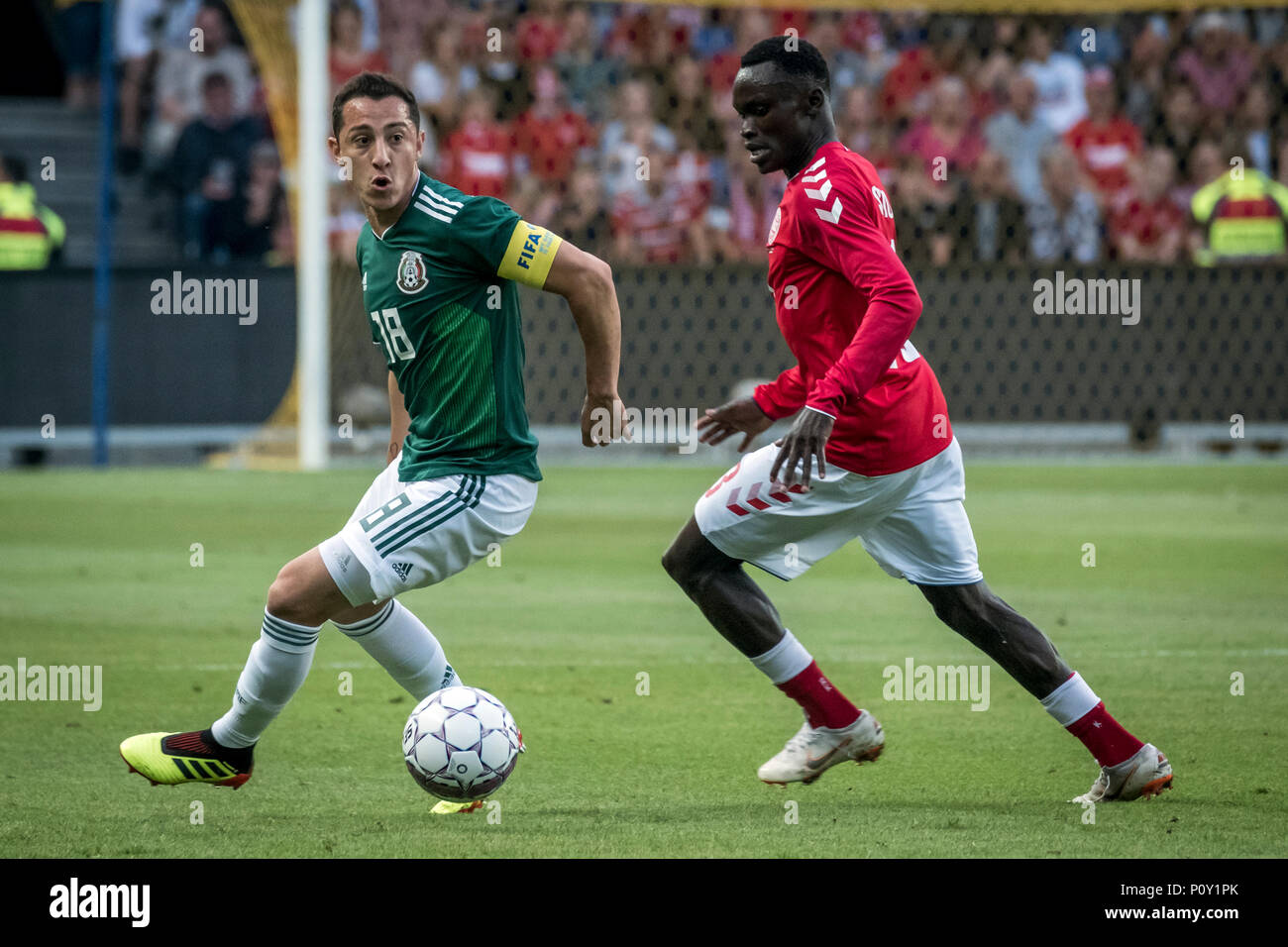 Denmark, Brøndby - June 09, 2018. Pione Sisto (23) of Denmark and Andres Guardado (18) of Mexico seen during the football friendly between Denmark and Mexico at Brøndby Stadion. (Photo credit: Gonzales Photo - Kim M. Leland). Credit: Gonzales Photo/Alamy Live News Stock Photo