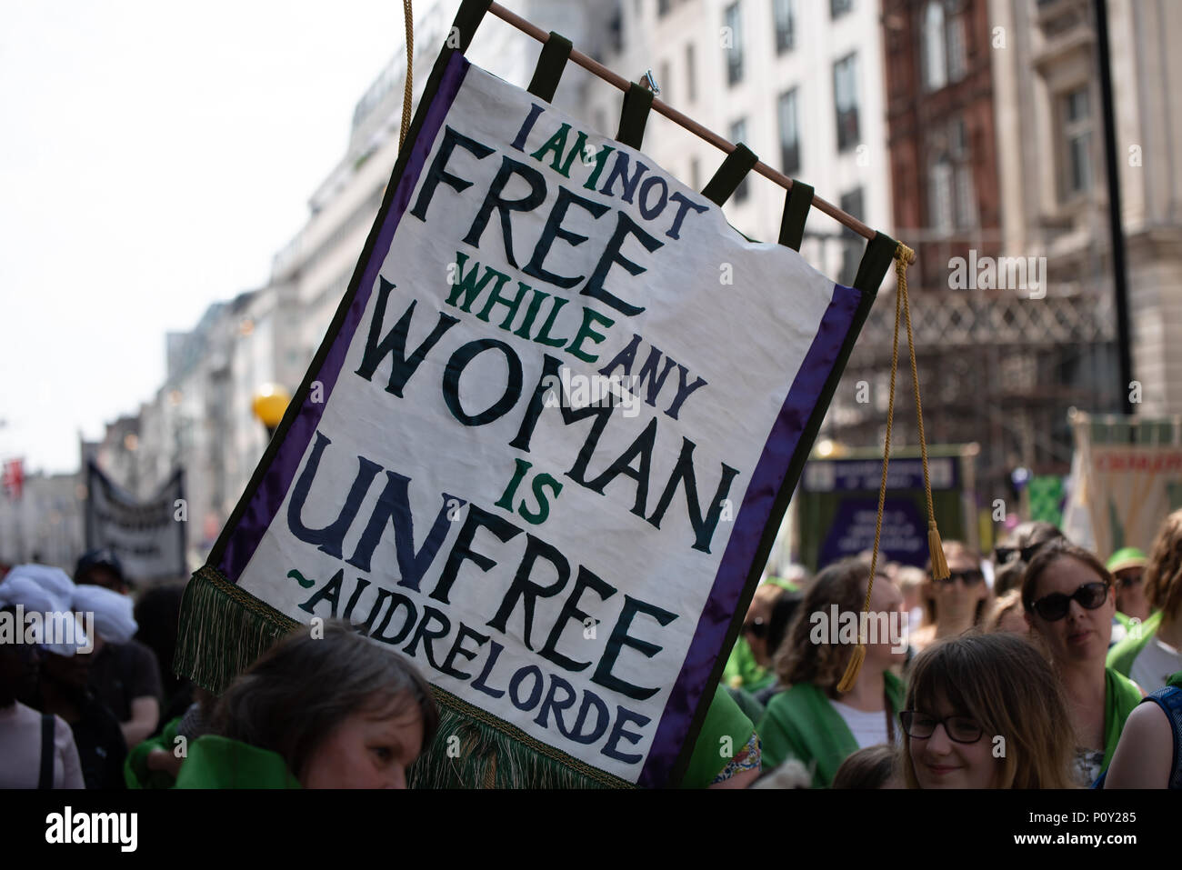 Women Rights Color Women marching through London to mark 100 years since the first British ...