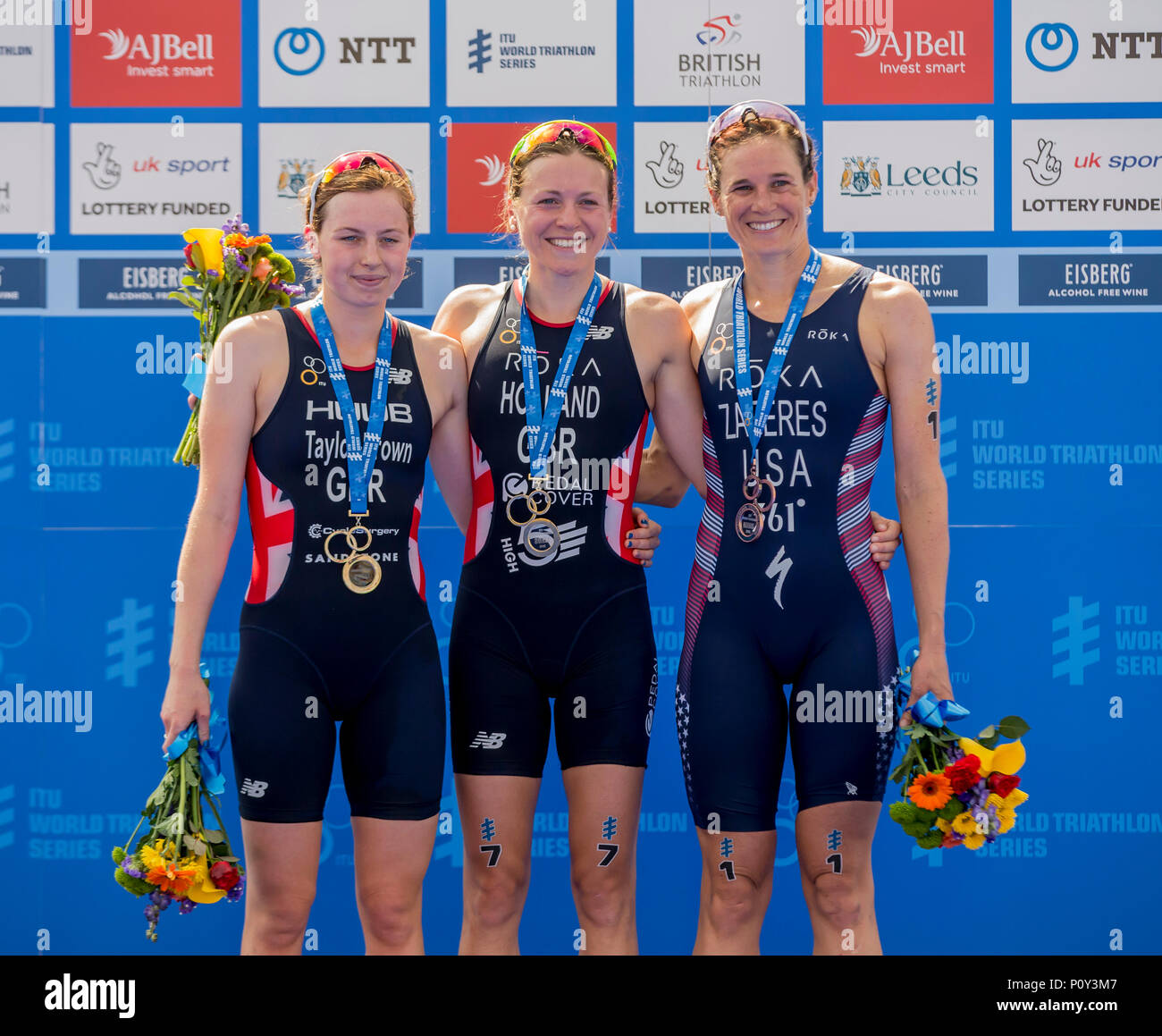 Leeds, UK. 10th June, 2018. AJ Bell World Triathlon Series, Leeds; Jessica Learmonth (GBR) on the podium wearing her medal after winning the Elite Womens race along with Georgia Taylor Brown (GBR) and Katie Zaferes who came second and third places respectively Credit: Action Plus Sports/Alamy Live News Stock Photo