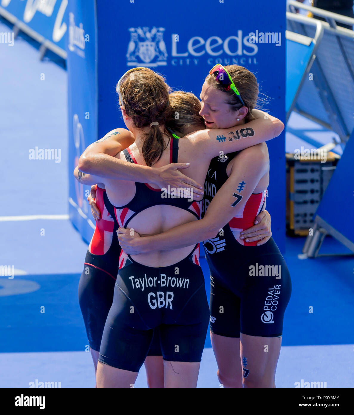 Leeds, UK. 10th June, 2018. AJ Bell World Triathlon Series, Leeds; Jessica Learmonth (GBR) and Georgia Taylor Brown (GBR) and Vicky Holland (GBR) hug each other after finishing during the Elite Womens race of the AJ Bell World Triathlon Leeds Credit: Action Plus Sports/Alamy Live News Stock Photo