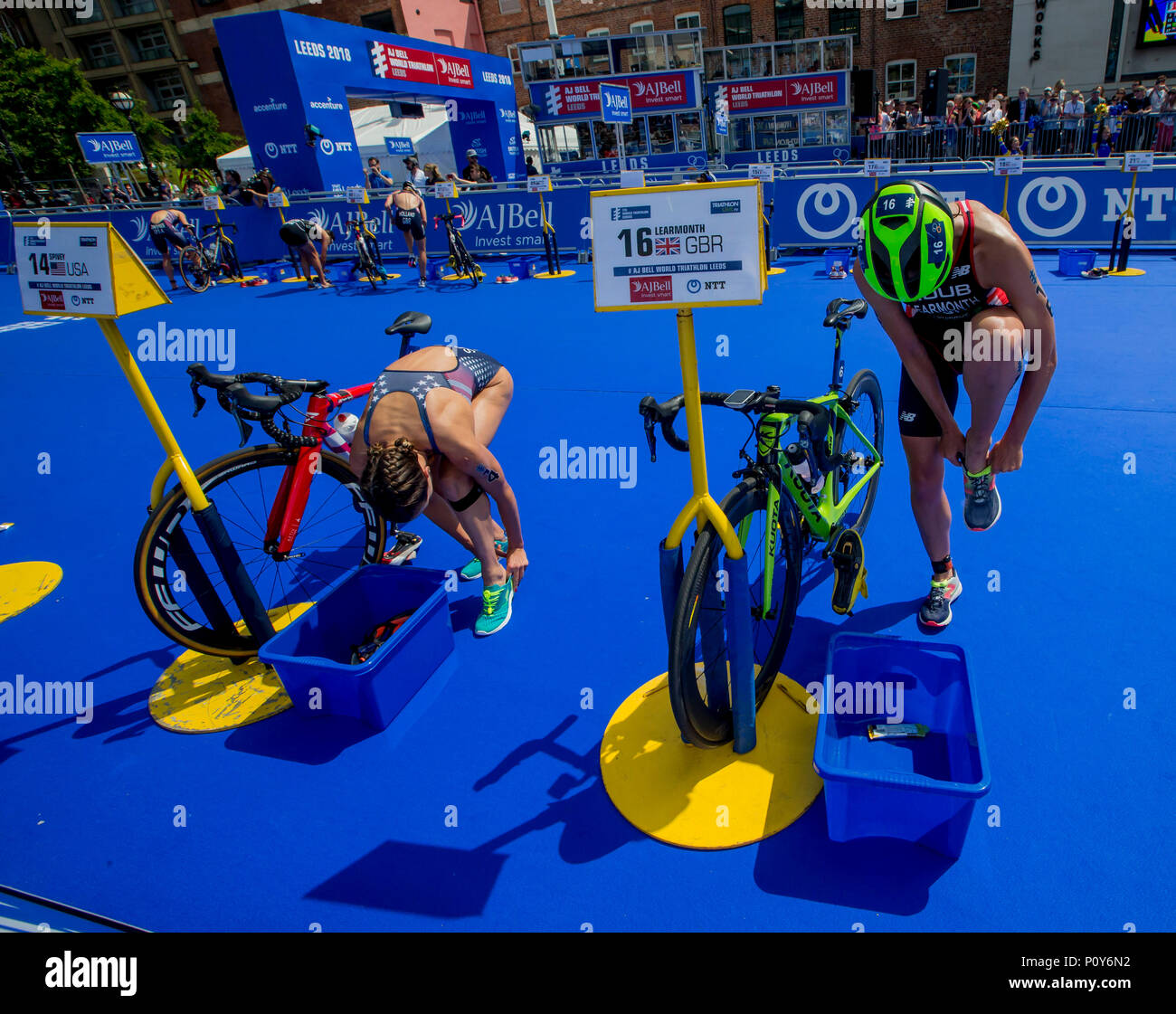 Leeds, UK. 10th June, 2018. AJ Bell World Triathlon Series, Leeds; Taylor Spivey (USA) and Jessica Learmonth (GBR) parks in Transition 2 preparing to start the Run Discipline of the AJ Bell World Triathlon Leeds Credit: Action Plus Sports/Alamy Live News Stock Photo