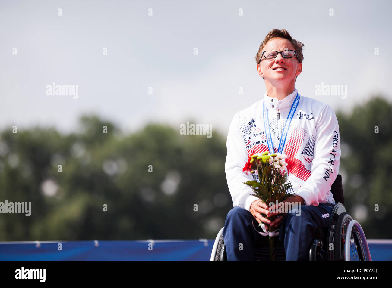 Belgrade, Serbia. 10th Jun, 2018. Emma Wiggs of GBR celebrates on the podium at the medal ceremony for the Women's KL2, 200m sprint race Credit: Nikola Krstic/Alamy Live News Stock Photo