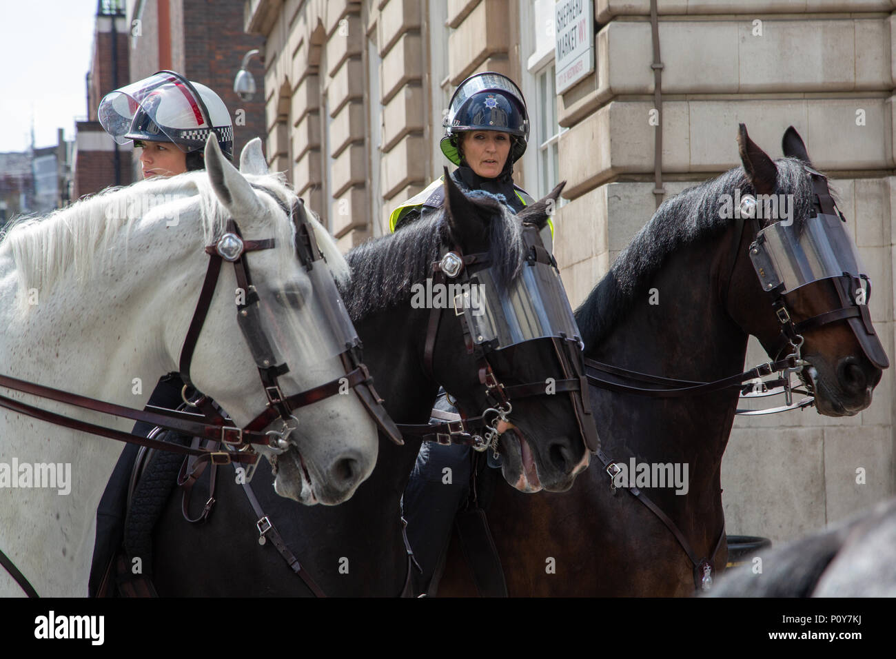 London, UK - 10 June 2018:  As women marched through London to celebrate the centenary of women getting the vote, nearby in Mayfair women were on the front line of an aggressive counter-demonstration as Free Tommy Robinson supporters abused Muslims on an Quds Day anti-Israeli demonstration. Credit: On Sight Photographic/Alamy Live News Stock Photo