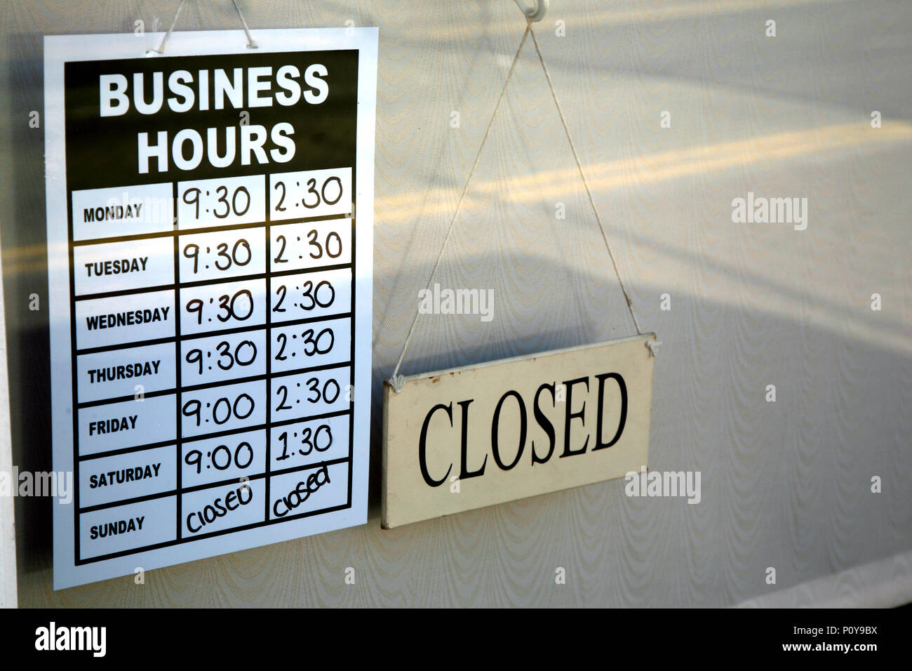 Opening hours in a small cafe in Dinnington South Yorkshire an old