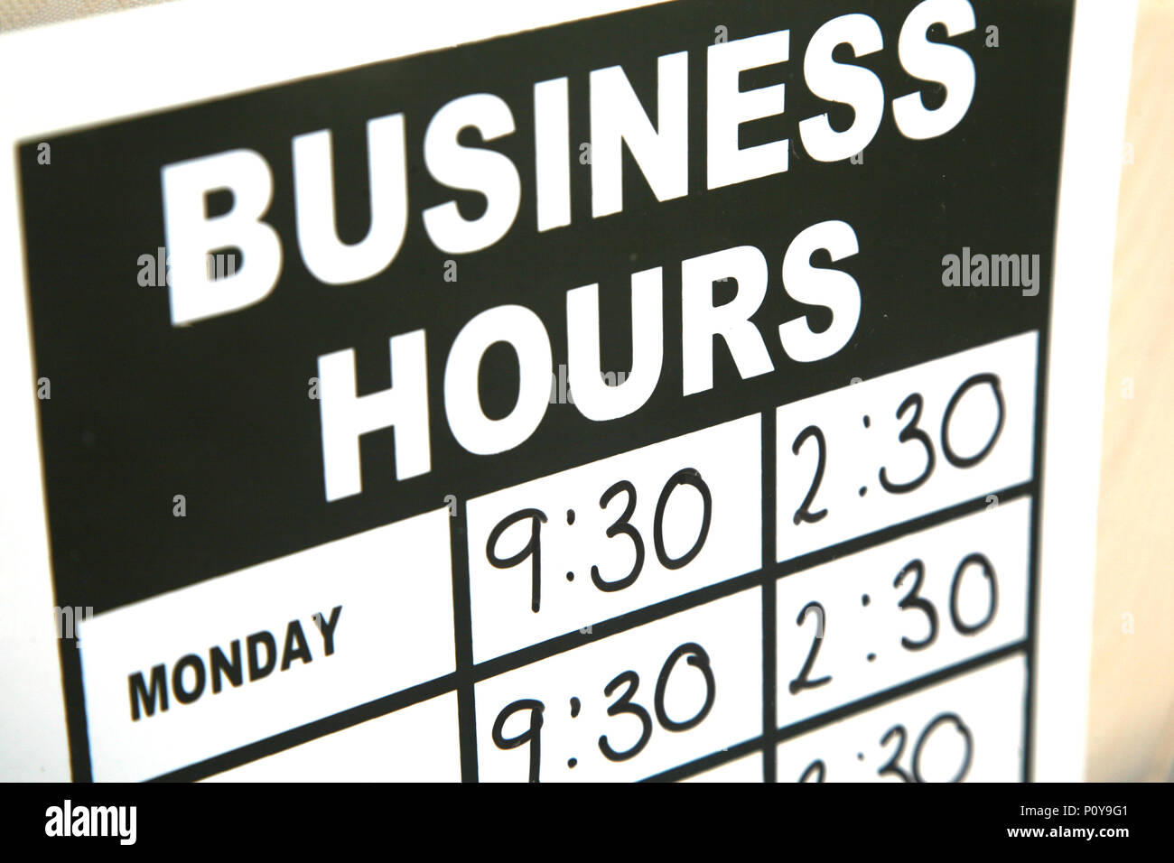 Opening hours in a small cafe in Dinnington South Yorkshire an old