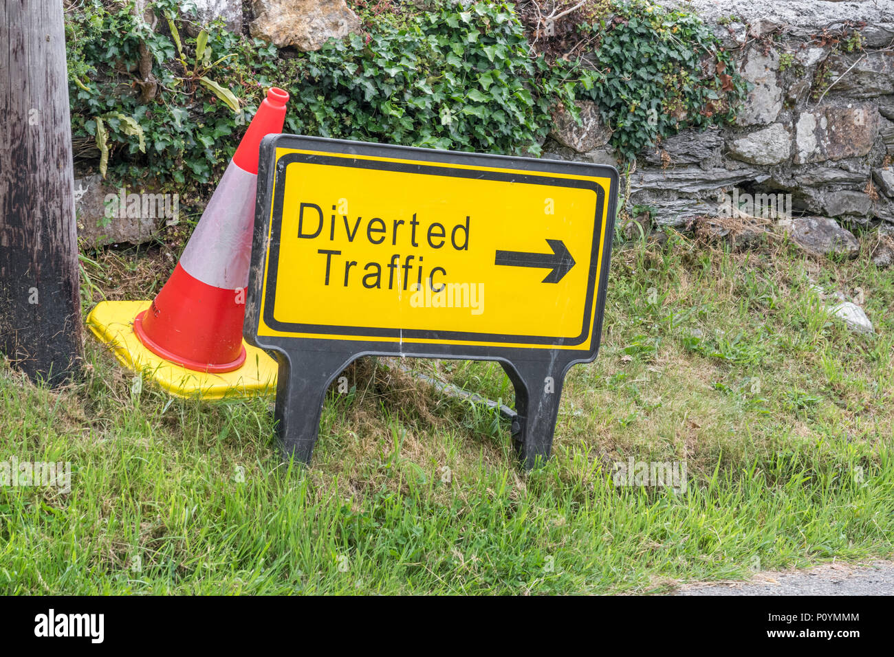 Yellow 'Diverted Traffic' sign. For lost data, alternative routes